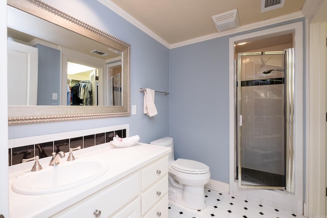 5313 N Grandview St, Little Rock, AR 72207 - full bathroom with vanity, a shower stall, a spacious closet, toilet, and ornamental molding