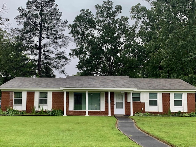 5405 Dreher Ln, Little Rock, AR 72209 - ranch-style home with brick siding and a front yard