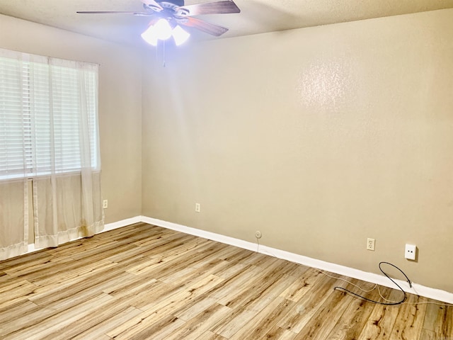 5405 Dreher Ln, Little Rock, AR 72209 - empty room featuring a ceiling fan, wood finished floors, and baseboards