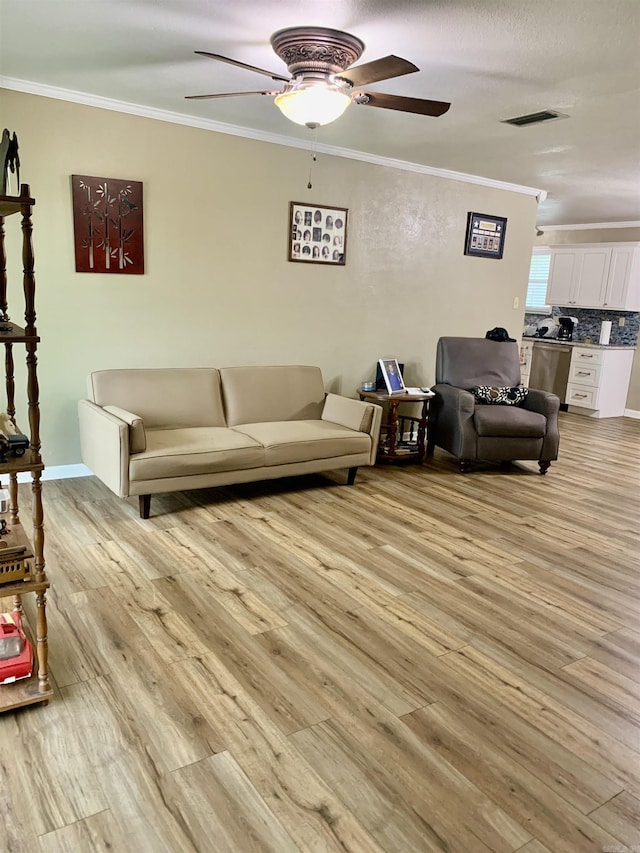 5405 Dreher Ln, Little Rock, AR 72209 - living area featuring a ceiling fan, light wood-style floors, and crown molding