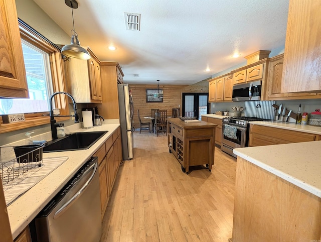 149 Polk Rd Unit 714, Mena, AR 71953 - kitchen with appliances with stainless steel finishes, a sink, light countertops, plenty of natural light, and recessed lighting