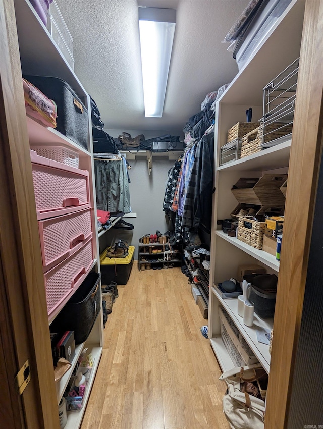 149 Polk Rd Unit 714, Mena, AR 71953 - walk in closet with wood finished floors