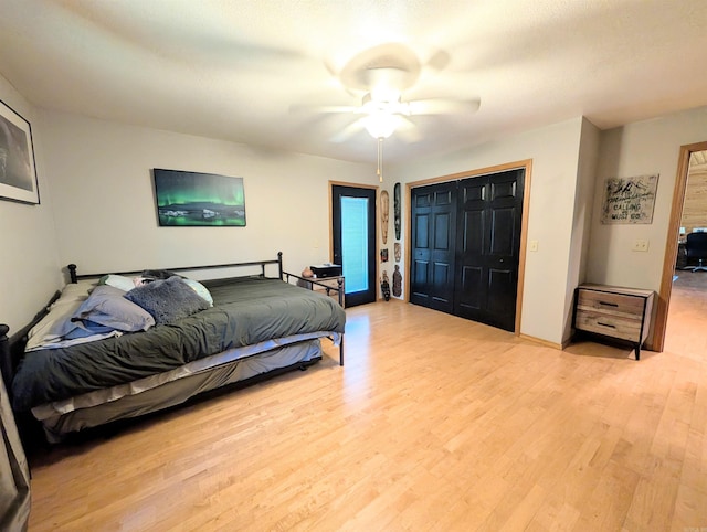 149 Polk Rd Unit 714, Mena, AR 71953 - bedroom with wood finished floors, a closet, and ceiling fan