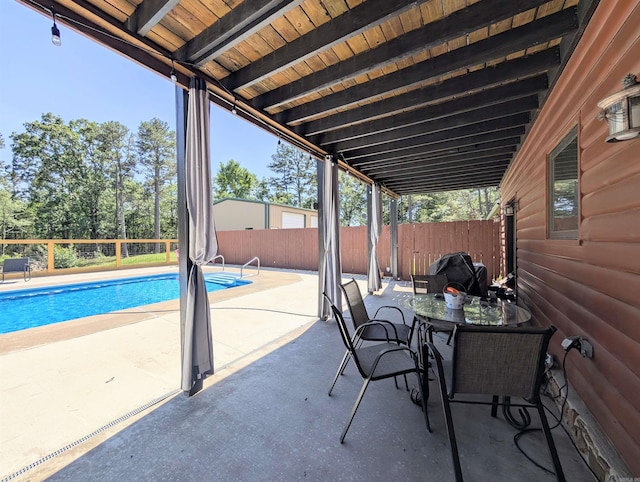149 Polk Rd Unit 714, Mena, AR 71953 - fenced backyard with a patio area