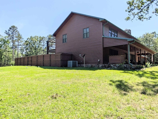 149 Polk Rd Unit 714, Mena, AR 71953 - view of side of home featuring a chimney and cooling unit