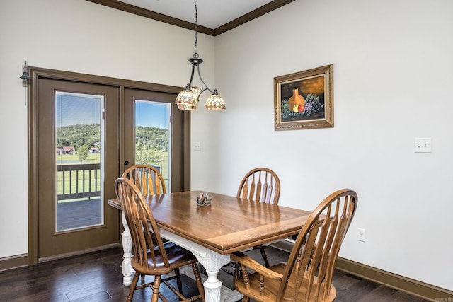 410 Rocky Point Rd, Vilonia, AR 72173 - dining area featuring ornamental molding, baseboards, and dark wood finished floors