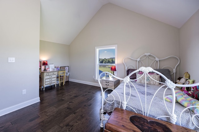 410 Rocky Point Rd, Vilonia, AR 72173 - bedroom with lofted ceiling, wood finished floors, and baseboards