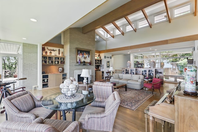 8 River View Pt, Little Rock, AR 72227 - living area with a towering ceiling, wood finished floors, and beam ceiling