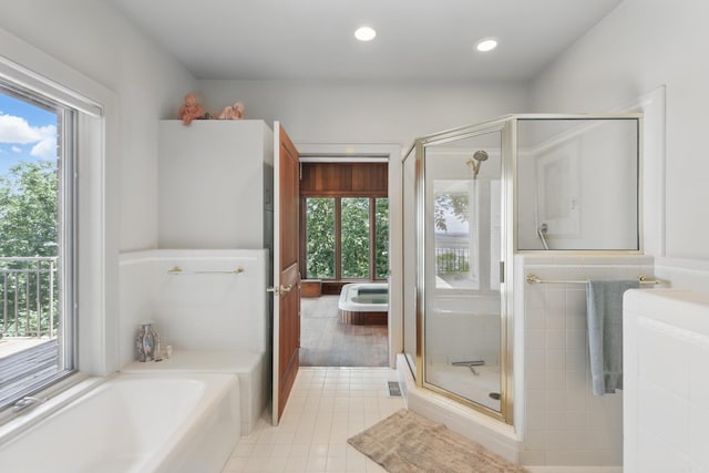 8 River View Pt, Little Rock, AR 72227 - full bathroom with healthy amount of natural light, a bath, a stall shower, recessed lighting, and tile patterned flooring