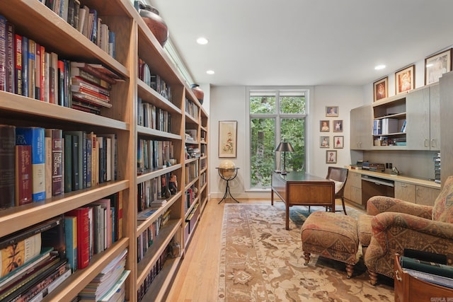 8 River View Pt, Little Rock, AR 72227 - office featuring bookshelves, recessed lighting, and wood finished floors