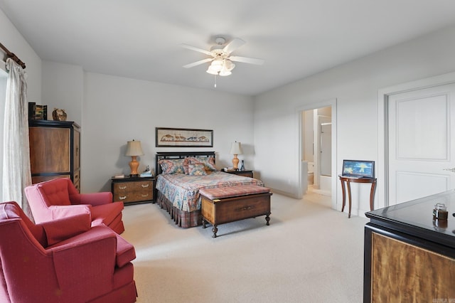 8 River View Pt, Little Rock, AR 72227 - bedroom with light carpet, ensuite bathroom, ceiling fan, and baseboards
