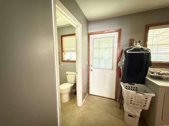 221 N Garfield Ave, Piggott, AR 72454 - bathroom with toilet and baseboards