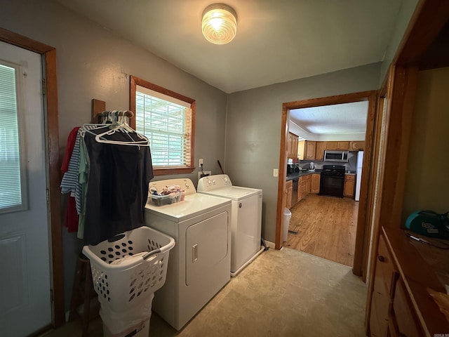 221 N Garfield Ave, Piggott, AR 72454 - washroom featuring separate washer and dryer