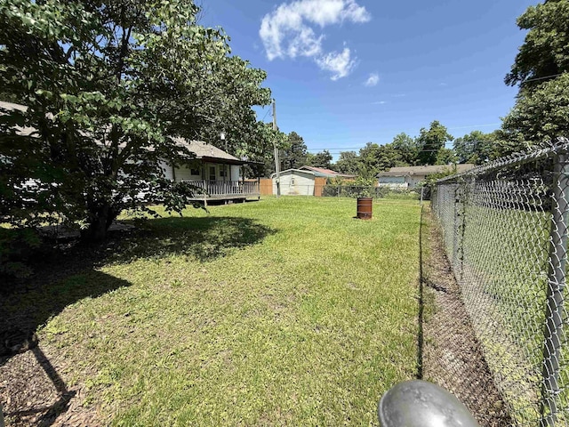 221 N Garfield Ave, Piggott, AR 72454 - view of yard featuring a wooden deck
