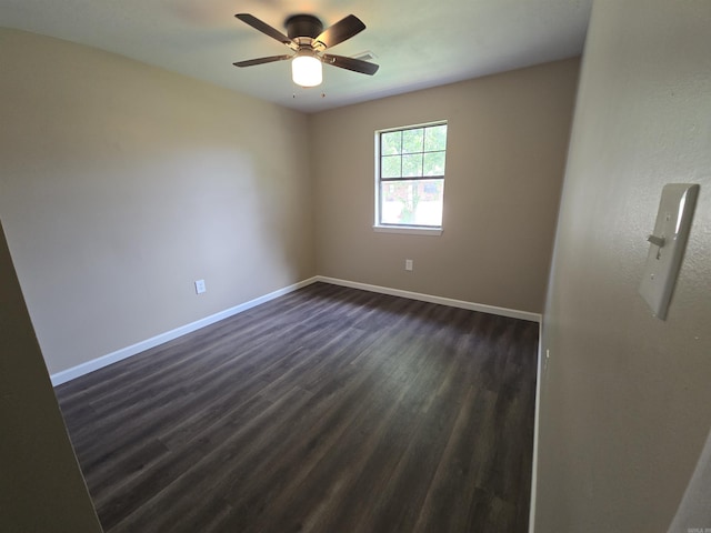 311 Ce Brawner Rd, Wynne, AR 72396 - empty room with dark wood-type flooring, baseboards, and a ceiling fan