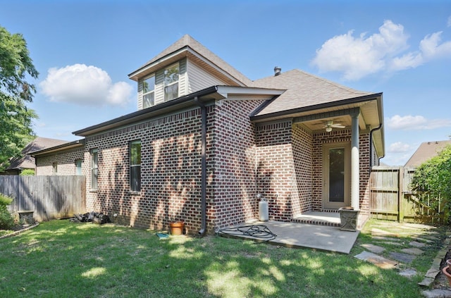 5400 Montgomery Rd, Little Rock, AR 72223 - back of property featuring a ceiling fan, brick siding, and a patio area