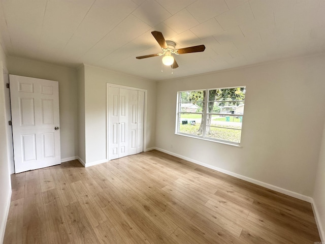 3003 Hollywood St, Texarkana, TX 75503 - unfurnished bedroom with baseboards, a closet, and light wood-style floors