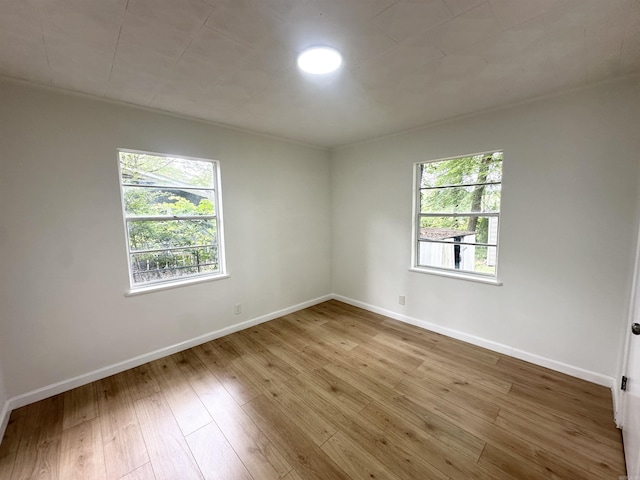3003 Hollywood St, Texarkana, TX 75503 - spare room with wood finished floors and baseboards