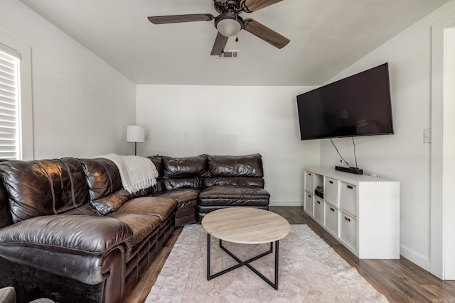1647 Gresham St, Arkadelphia, AR 71923 - living area featuring a ceiling fan, dark wood-style floors, vaulted ceiling, and baseboards