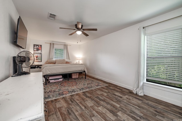 1647 Gresham St, Arkadelphia, AR 71923 - bedroom with wood finished floors, baseboards, and ceiling fan