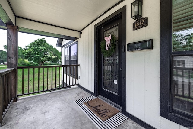 1647 Gresham St, Arkadelphia, AR 71923 - view of exterior entry featuring covered porch