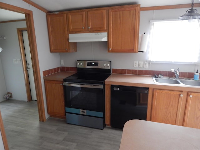 505 Main, West Point, AR 72178 - kitchen featuring black dishwasher, under cabinet range hood, stainless steel range with electric cooktop, a sink, and light wood-style flooring