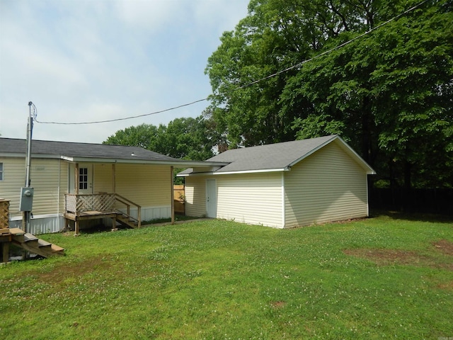 505 Main, West Point, AR 72178 - view of green lawn featuring an outbuilding