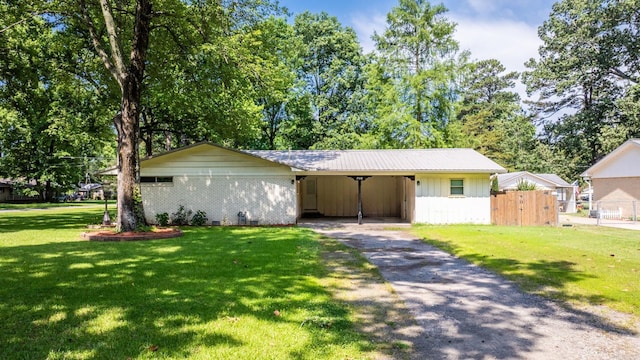 7110 Forest Dale Dr, North Little Rock, AR 72118 - ranch-style house featuring driveway, an attached carport, and board and batten siding