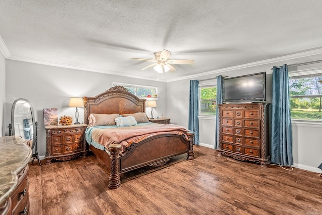7110 Forest Dale Dr, North Little Rock, AR 72118 - bedroom featuring ornamental molding, wood finished floors, multiple windows, a textured ceiling, and baseboards