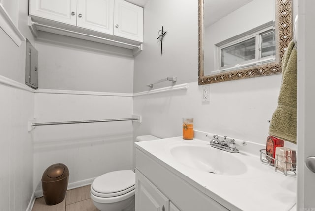 7110 Forest Dale Dr, North Little Rock, AR 72118 - bathroom with toilet, vanity, and tile patterned floors