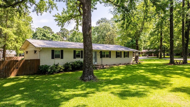 7110 Forest Dale Dr, North Little Rock, AR 72118 - view of front of home with brick siding and metal roof