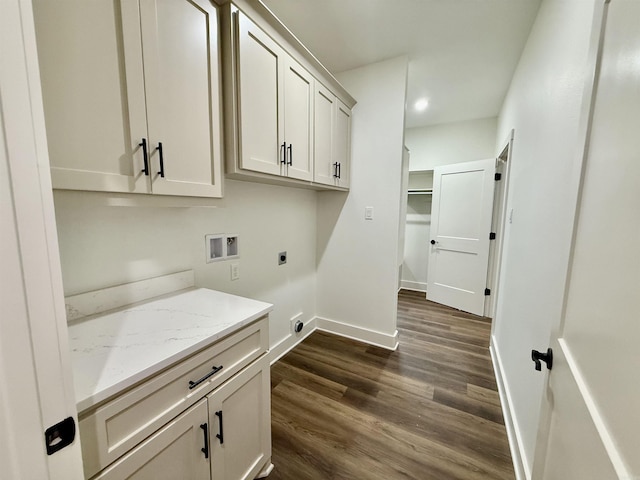 107 Elcano Dr, Hot Springs Village, AR 71909 - washroom with hookup for an electric dryer, cabinet space, hookup for a washing machine, dark wood-type flooring, and baseboards