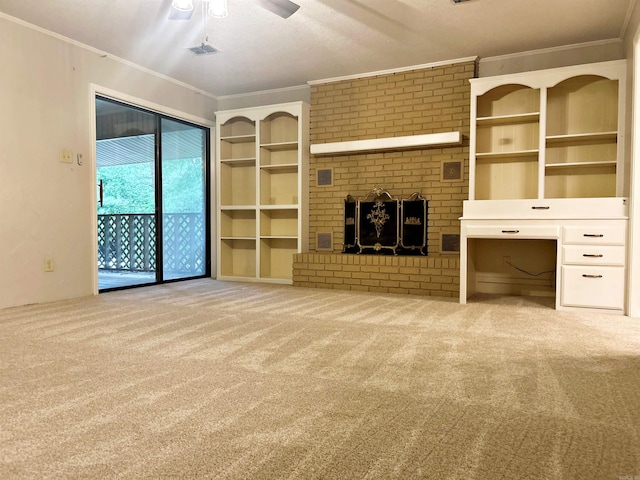 unfurnished living room featuring ornamental molding, carpet flooring, ceiling fan, and a brick fireplace