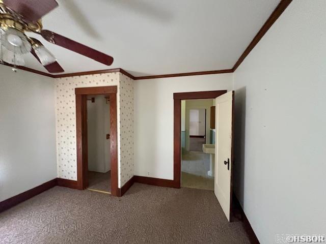 405 3rd Ave, Murfreesboro, AR 71958 - empty room with ornamental molding, carpet flooring, baseboards, and ceiling fan