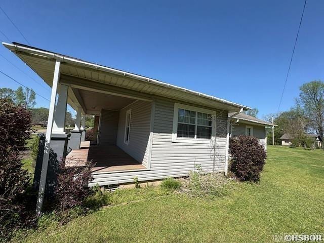 405 3rd Ave, Murfreesboro, AR 71958 - view of home's exterior with a lawn