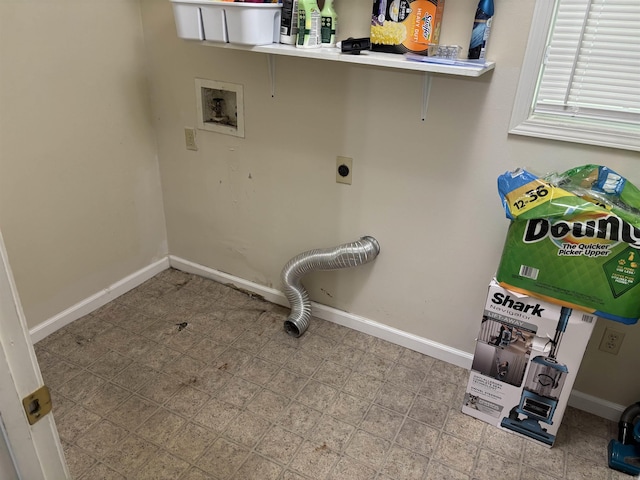 1006 Austin St, Camden, AR 71701 - laundry area with hookup for an electric dryer, hookup for a washing machine, and baseboards