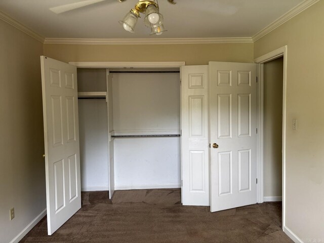 1006 Austin St, Camden, AR 71701 - unfurnished bedroom featuring dark carpet, a closet, crown molding, and baseboards