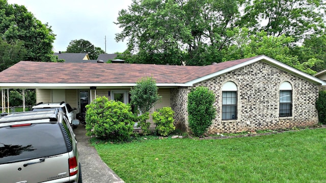 514 Proft Cir, Mena, AR 71953 - single story home featuring a front lawn and a shingled roof