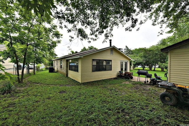 514 Proft Cir, Mena, AR 71953 - back of property with cooling unit