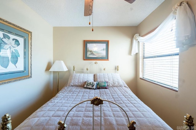 135 Hillview # 38, Fairfield Bay, AR 72088 - bedroom featuring a textured ceiling, multiple windows, and ceiling fan