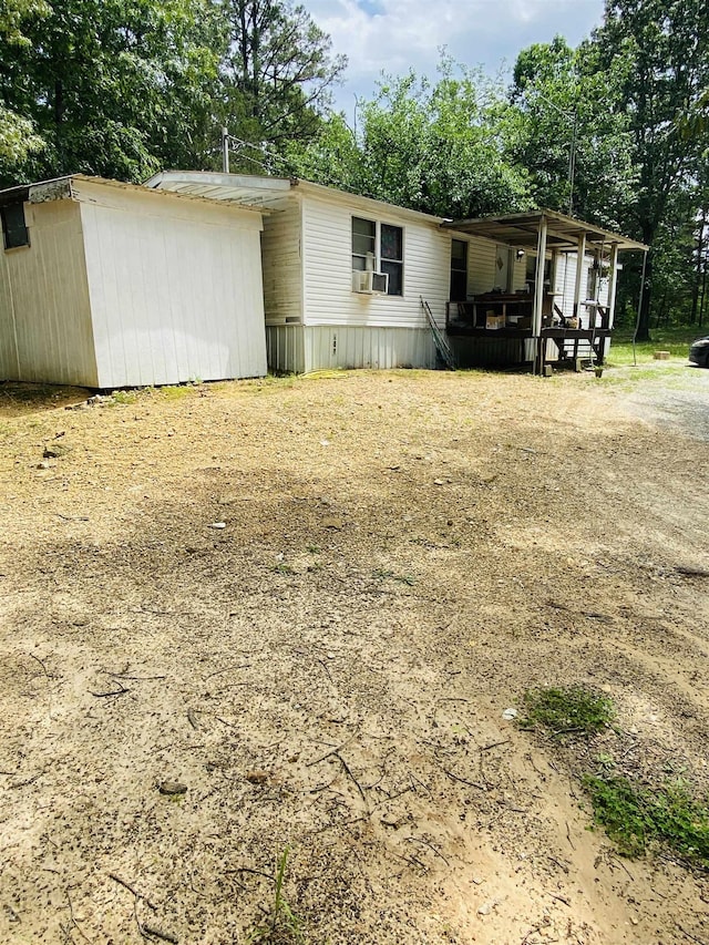 42 Beran Ln, Calico Rock, AR 72519 - view of front of home featuring view of wooded area
