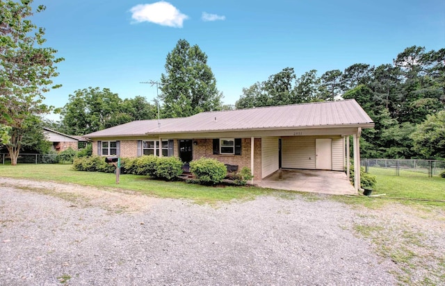 2931 Salem Rd, Benton, AR 72019 - ranch-style home with driveway, a carport, metal roof, and brick siding