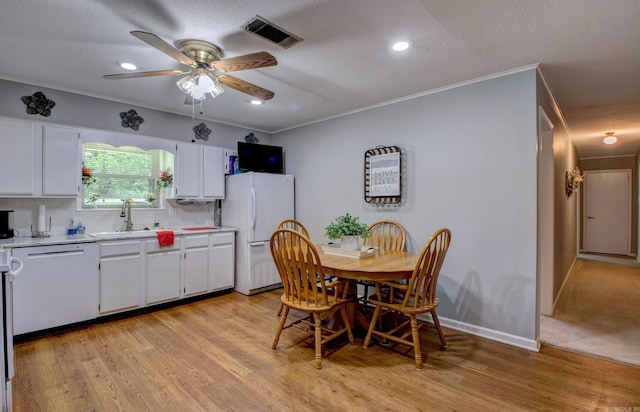 2931 Salem Rd, Benton, AR 72019 - dining space featuring crown molding, a ceiling fan, light wood-style floors, recessed lighting, and a textured ceiling