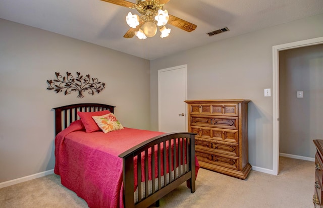2931 Salem Rd, Benton, AR 72019 - bedroom with light carpet, baseboards, and a ceiling fan