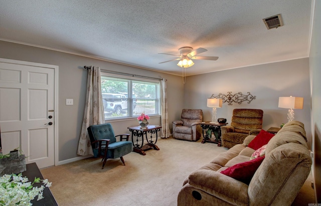 2931 Salem Rd, Benton, AR 72019 - carpeted living area with ceiling fan, ornamental molding, a textured ceiling, and baseboards