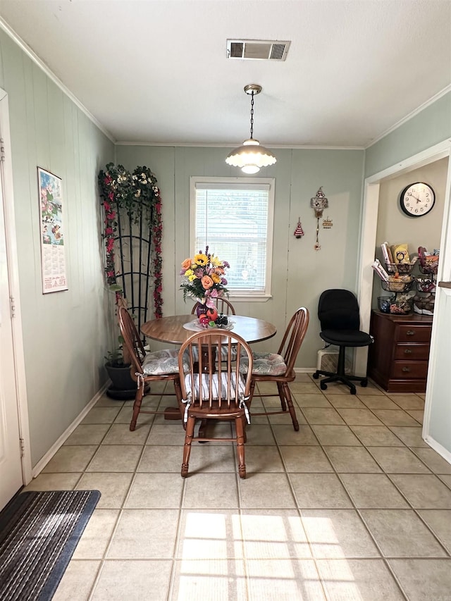 300 Michelle Ave, White Hall, AR 71602 - dining space featuring light tile patterned floors and crown molding