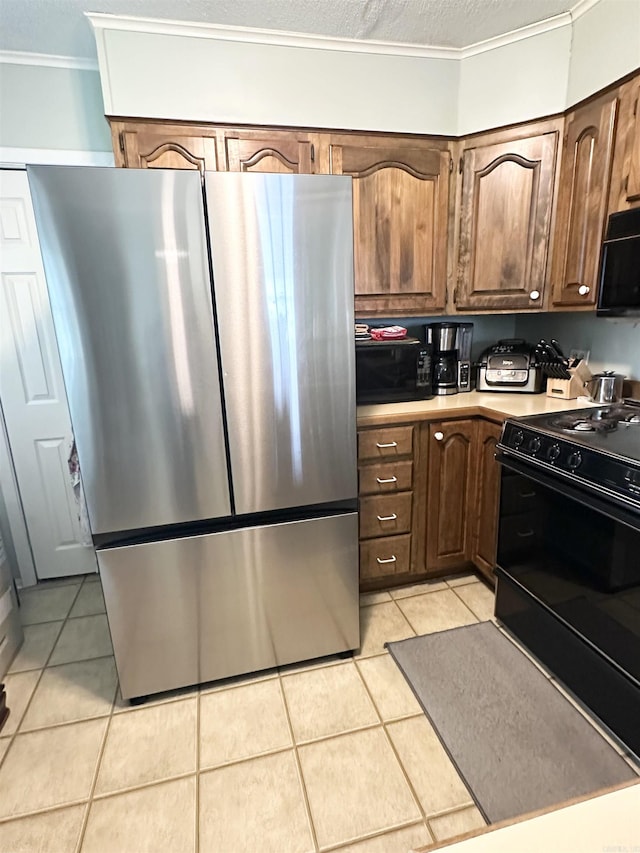 300 Michelle Ave, White Hall, AR 71602 - kitchen featuring black appliances, light tile patterned floors, crown molding, and light countertops