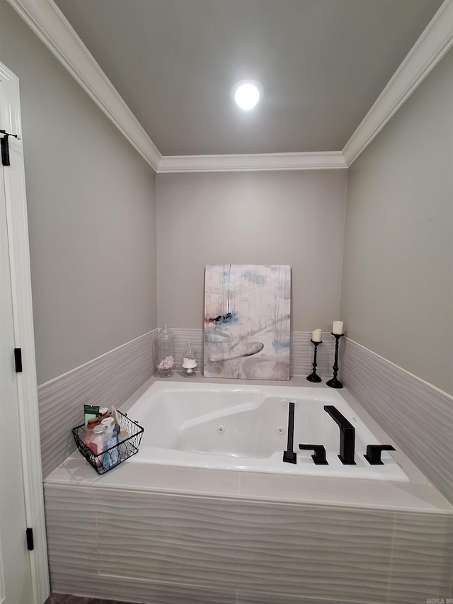4401 Wagon Trace Cv, White Hall, AR 71602 - bathroom featuring a tub with jets and ornamental molding
