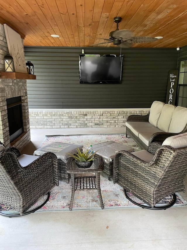 4401 Wagon Trace Cv, White Hall, AR 71602 - living area with wooden ceiling and a brick fireplace