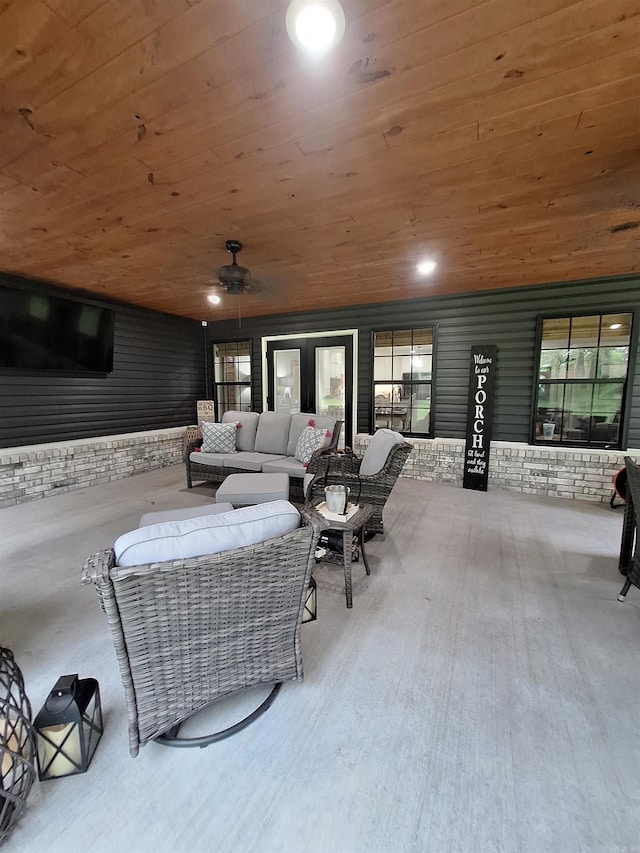 4401 Wagon Trace Cv, White Hall, AR 71602 - living area with wood ceiling, healthy amount of natural light, and a ceiling fan